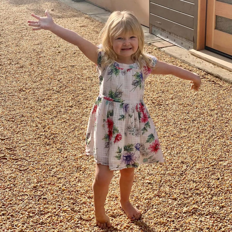 Owners granddaughter enjoying the Gravelpave2 driveway with bare feet.